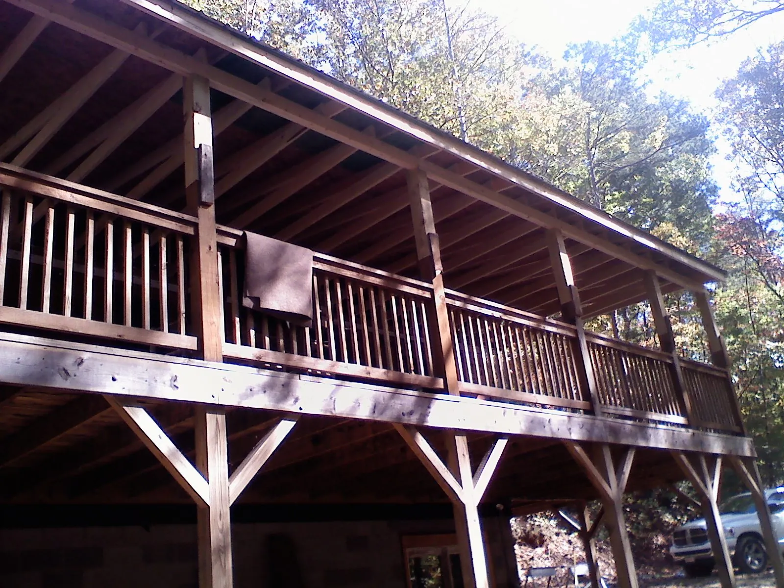 Timber framing under a new elevated porch and deck — Roof Leak Repair in Dania by Roofing Brothers